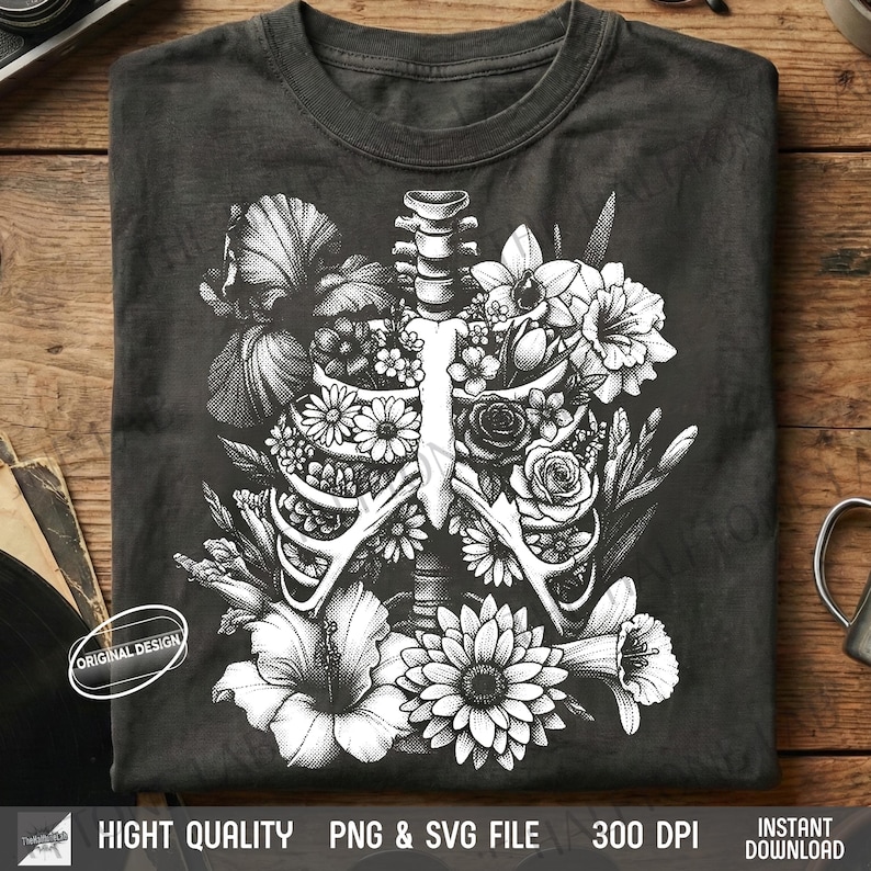 Dark grey t-shirt flat lay featuring a vintage halftone Skull with roses growing out, gothic valentine design.