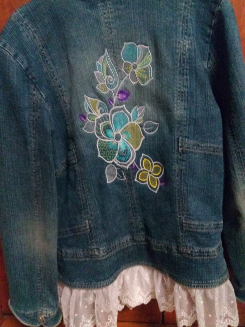 Personalized jean jacket with machine embroidered back