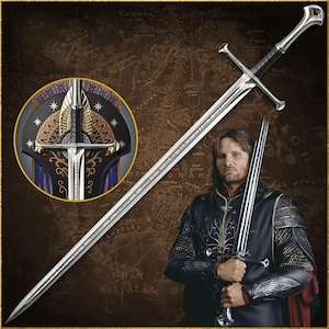 May include: A silver sword with a long blade and crossguard, featuring engraved text. The sword is displayed with a matching shield and a person holding a similar sword. The background is a map.
