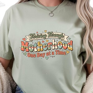 Thriving Through Motherhood Shirt, Mom Life Shirt, One Day At A Time Tee, Funny Mom Shirt, Gift For Mom, Retro Mom Shirt