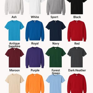 May include: A color chart of Gildan 1800 apparel, including t-shirts and sweatshirts, in various colors such as ash, white, black, red, and purple. The image displays the color options available, with the brand name "myteesco" at the bottom.