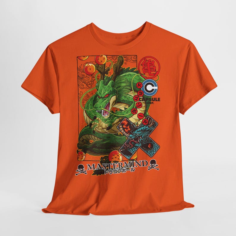 May include: Orange t-shirt featuring a green dragon illustration with the text "MASTERMIND" and Japanese text. The design includes dragon balls, a Capsule Corp logo, and a blue dragon graphic.