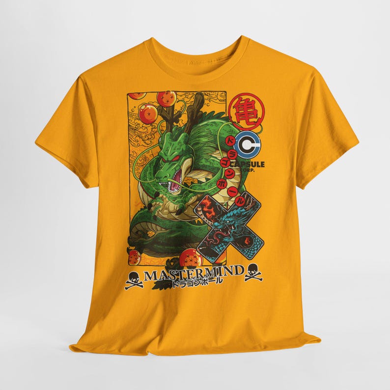 May include: Mustard yellow t-shirt featuring a green dragon illustration with red and gold accents. The design includes Japanese text and the words "MASTERMIND" and "CAPSULE CORP."