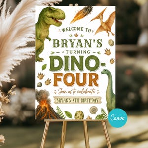 May include: A decorative sign on a wooden easel with a dinosaur theme. The sign reads "Welcome to Bryan's Turning Dino-Four" with illustrations of dinosaurs, a volcano, and an egg. The sign is designed for a 4th birthday celebration.