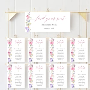 May include: Wedding seating chart with a floral and butterfly design. The chart includes a sign that says "find your seat" and individual table cards with guest names. The color scheme is soft pink and purple.