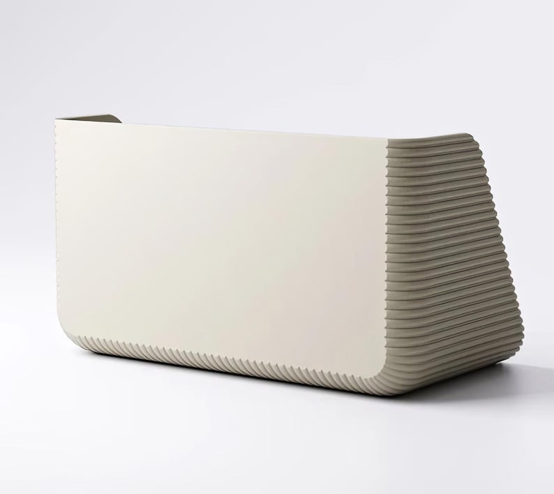 May include: A rectangular, off-white storage container with rounded corners and a smooth front panel. The sides and bottom feature a distinct, horizontal ribbed texture that wraps around the exterior, creating a contrast with the flat face.