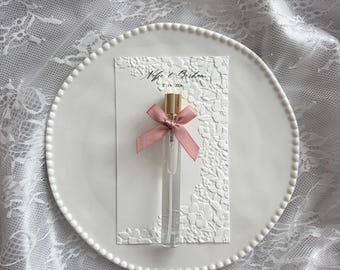 Embossed spray bottle – party favor with floral motif