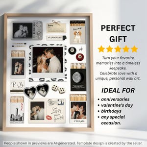 May include: A framed collage featuring multiple photographs, matchboxes with custom prints, billiard balls, dice, and a heart-shaped locket. The display includes various romantic imagery, text elements, and graphic designs arranged within a light wood frame.