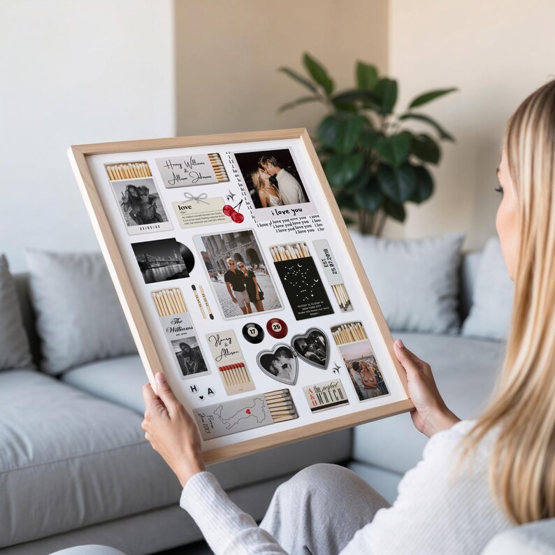 May include: A framed collage featuring photographs, matchboxes, and decorative elements. The photos are black and white and color, with text that says "I love you" and names. The frame is light brown.