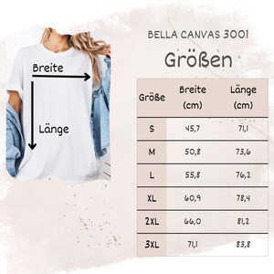 May include: A white Bella Canvas 3001 t-shirt with a size chart. The chart shows measurements in centimeters for sizes S through 3XL. The shirt's width ranges from 18 inches to 28 inches, and the length ranges from 28 inches to 33 inches.