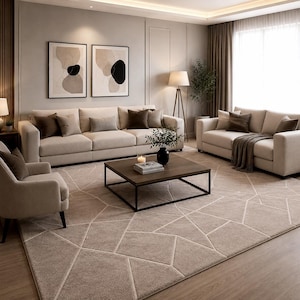 May include: A living room set featuring a large beige sofa, a smaller matching sofa, and an armchair. A square wooden coffee table with a black metal frame sits in the centre on a large beige area rug with a geometric white line pattern.
