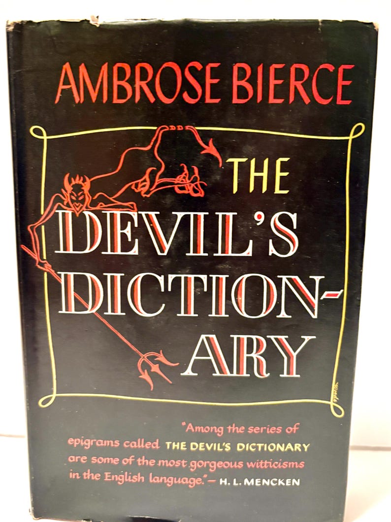 May include: A book cover for "The Devil's Dictionary" by Ambrose Bierce. The cover is black with red and white text, and a devil illustration. A quote from H.L. Mencken is also included.