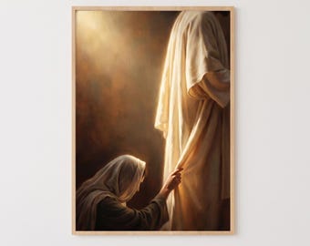 May include: A framed wall art print depicting a figure in a hooded robe kneeling and reaching out to touch the hem of a long, flowing cream-colored garment worn by a standing figure. The scene is set against a dark, warm-toned background.