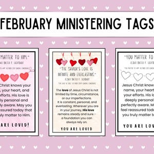 Può includere: Tag a tema San Valentino rosa e bianchi con testo. I tag presentano cuori e messaggi ispiratori. Il banner in alto recita "FEBRUARY MINISTERING TAGS". Ogni tag ha un bordo nero e uno sfondo bianco.