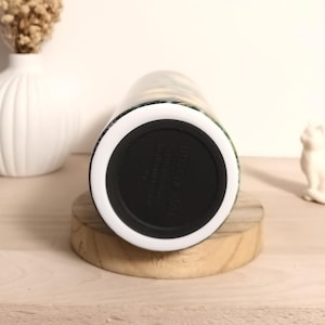 May include: A set of three ceramic mugs with a speckled, matte finish. The mugs are in shades of cream, light gray, and dark gray. Each mug has a simple, minimalist design, perfect for coffee or tea.