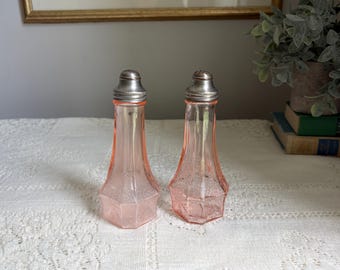 Vintage roze depressieglazen zoutpeperstel set