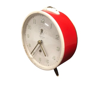 Red vintage retro metal alarm clock with alarm function
