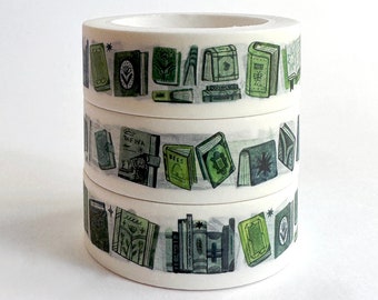 May include: Three rolls of washi tape with a green and white book design. The tape features illustrations of books with different titles and designs.