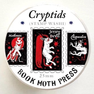 May include: A roll of washi tape featuring illustrations of cryptids, including Mothman, Jersey Devil, and Chupacabra. The tape is 25mm wide and has the text "Cryptids" and "Book Moth Press" printed on it. The illustrations are in black, red, and white.