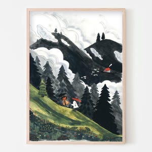 May include: Watercolor art print of a mountain landscape with a forest and two figures walking on a green hillside. The artwork features a small red house, dark trees, and a cloudy sky, all framed in a light wood frame.