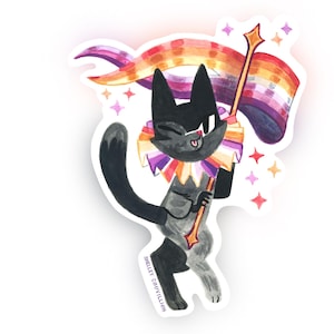 Könnte beinhalten: Ein Aufkleber mit einer schwarzen Katze, die eine Regenbogenfahne und einen Stab mit einem Stern hält. Die Katze trägt einen bunten Rüschenkragen und zwinkert. Der Aufkleber hat einen weißen Rand und ist mit sternförmigen Glitzer verziert.