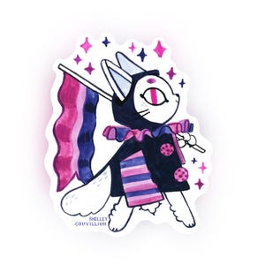 May include: A white cat illustration with a black and pink outfit, holding a flag with pink, purple, and blue stripes. The cat has a pink eye and is surrounded by pink and purple stars. The artist's name, Shelley Couvillion, is at the bottom.