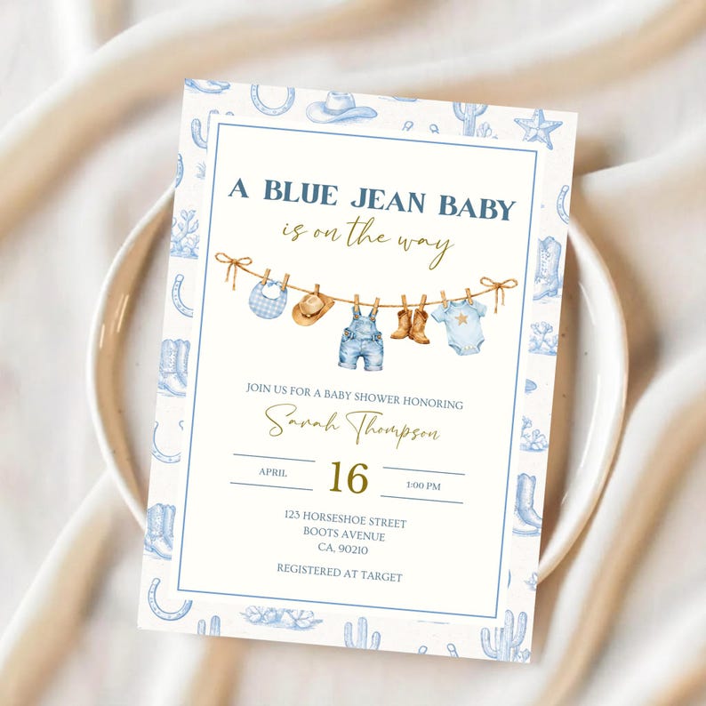 May include: A baby shower invitation with a blue jean theme. The invitation features the text "A BLUE JEAN BABY is on the way" and includes illustrations of baby clothes and cowboy boots. The invitation is for Sarah Thompson's baby shower on April 16th.