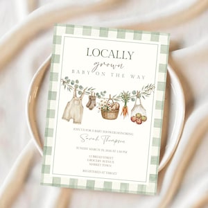 May include: A baby shower invitation with a green gingham border. The invitation features the text "Locally Grown, Baby on the Way." Illustrations include overalls, socks, a basket of flowers, carrots, and apples. The invitation is for Sarah Thompson.