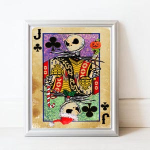 May include: Framed art print featuring a skeletal figure in a playing card design. The Jack of Clubs card has a vintage aesthetic with a colorful design, including a candy cane and pumpkin. The artwork is in a silver frame.