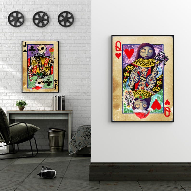 May include: Two framed playing card art prints. One features Jack Skellington as the Jack of Clubs, the other features Sally as the Queen of Hearts. The art has a vintage, distressed look with vibrant colors and black frames.