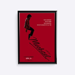 May include: Framed poster with a red background featuring Michael Jackson in a red jacket and black pants. The poster includes the text "Michael" in cursive, along with the phrases "You're Confident," "You're Strong," and "You're Beautiful."