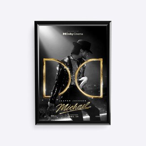 May include: A framed movie poster for "Michael" featuring Jaafar Jackson. The black and white image shows Jackson in a sequined jacket and fedora. Gold-colored "D" and "C" letters are overlaid on the image. The poster includes the text "Discover it at Dolby Cinema" and "In Theaters April 24".