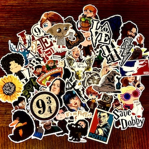 May include: A collection of colorful stickers featuring characters and symbols from the Harry Potter series. The stickers include images of characters, quotes, and iconic symbols like the lightning bolt and the Hogwarts crest.