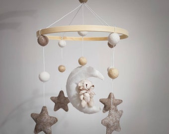 Plush teddy bear on a Moon with brown stars cot mobile with wool felt pom-pom balls & natural bamboo hoop frame, neutral colours available