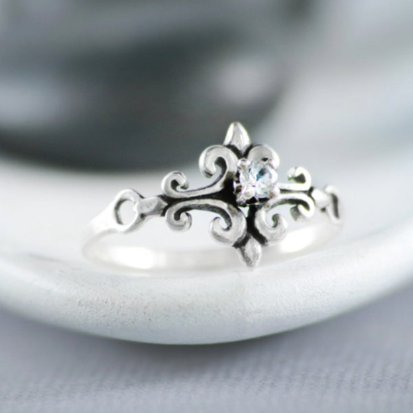 On SALE- Dainty Moissanite Ring, Sterling Silver Moissanite Engagement Ring, Fleur de Lis Ring, April Birthstone | Moonkist Designs