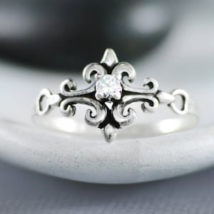 Size 8 Dainty Moissanite Ring, Sterling Silver Moissanite Engagement Ring, Fleur de Lis Ring, April Birthstone | Moonkist Designs