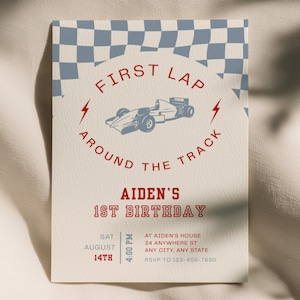 May include: A rectangular invitation card featuring a blue and white checkered pattern at the top. The center displays a race car illustration with the red text First Lap Around The Track, Aiden's 1st Birthday, and event details including date, time, and location.