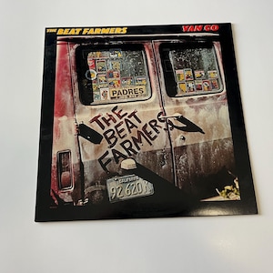 May include: A vintage vinyl record album cover featuring a faded, rusty, white van with the words "The Beat Farmers" and "Van Go" written on it. The van has a license plate that reads "California 92 620 K".