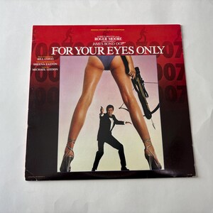 May include: Album cover for "For Your Eyes Only" featuring Roger Moore as James Bond. The cover art displays a woman holding a crossbow, with Bond aiming a gun. The title is in large white letters on a red background.