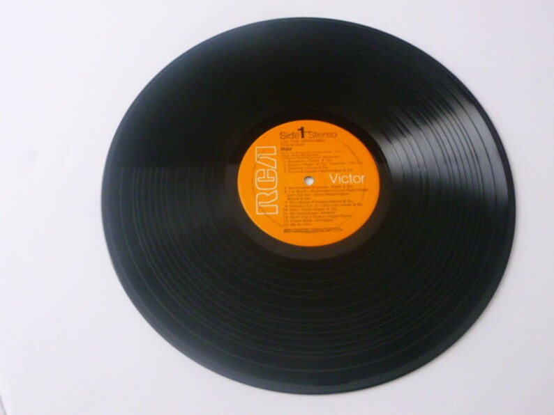 May include: Black vinyl record with an orange label that says "RCA Victor" and "Side 1 Stereo".