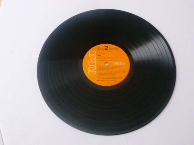 May include: Black vinyl record with an orange label that says "Side 2 Stereo" and "RCA Victor".