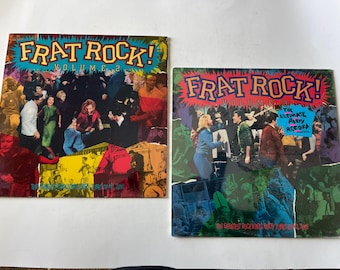 Puede incluir: Dos portadas de discos de vinilo con el título "Frat Rock!" en letras blancas y negritas sobre un fondo colorido. La primera portada está etiquetada como "Volumen 2" y presenta a un grupo de personas bailando y divirtiéndose. La segunda portada está etiquetada como "Volumen 1" y presenta a un grupo de personas bailando y divirtiéndose. Ambas portadas tienen el texto "The Ultimate Party Record".