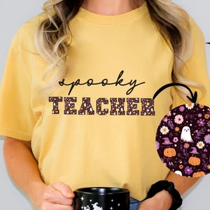 Komfortfarben gruseliges Lehrer-Halloween-Grafik-T-Shirt, niedliches Geist-Herbst-T-Stück, Blumen-Halloween-Lehrer-Shirt, lustiges Erzieher-Herbst-Shirt