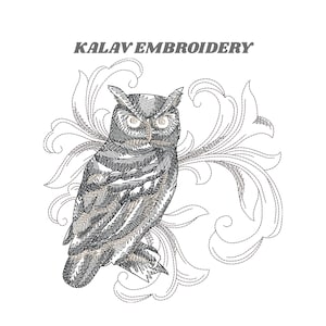 May include: An embroidered owl design in shades of gray and tan, with intricate detailing. The owl is perched against a decorative, swirling background. The text "KALAV EMBROIDERY" is above the owl.