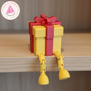 May include: A yellow gift box with a red ribbon and bow, with articulated yellow legs and feet. The gift box is sitting on a shelf. The image includes a circular graphic with the text "DIGITAL PRODUCT" and "nothing will be shipped".