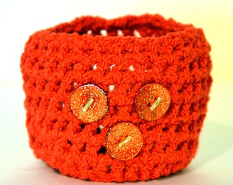 Wrist cuff/Tattoo cover, red spandex and cotton yarn with red sparkle shell buttons from Portugal.