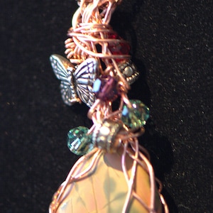 Cherry Creek Jasper necklace wrapped in copper with butterfly and Swarovski crystals on an 19 inch copper chain.