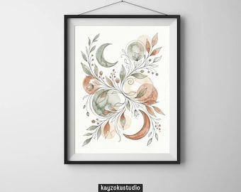 Op de afbeelding: Een ingelijste aquarelprint met een hemels ontwerp. Het toont halve manen, cirkels en botanische elementen in gedempte groen-, bruin- en oranje tinten. De zwarte lijst hangt aan een witte muur. De tekst "kayzokustudio" staat onderaan de print.