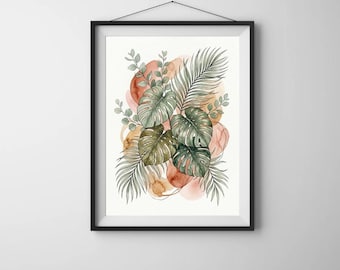 Op de afbeelding: Ingelijste aquarelprint met tropische bladeren en abstracte vormen in tinten groen, bruin en perzik. Het kunstwerk bevat grote monstera bladeren, palmbladeren en kleine takjes, waardoor een botanisch thema ontstaat. De print wordt weergegeven in een zwarte lijst.