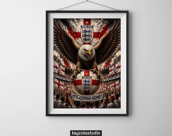 Op de afbeelding: Ingelijste kunstafdruk met een adelaar met uitgespreide vleugels, bovenop een voetbal met het Engelse embleem. De achtergrond toont de Engelse vlag en een menigte fans. De tekst "IT'S COMING HOME!" is zichtbaar.